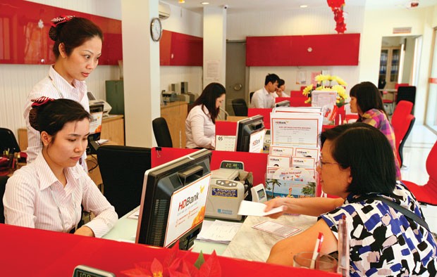 Có nên giảm tiếp trần lãi suất huy động? ảnh 1