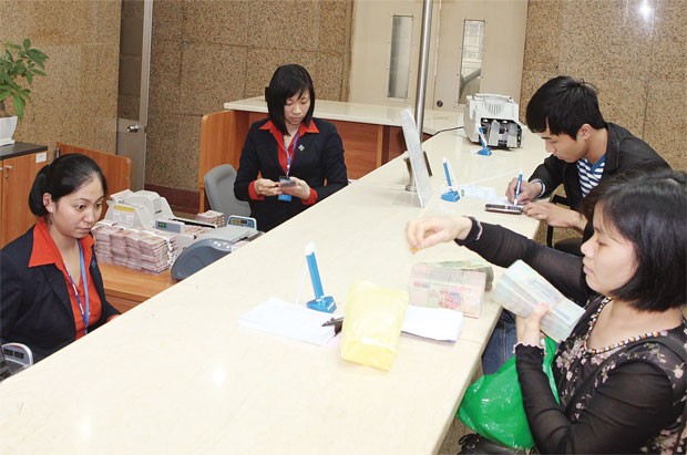 Lãi suất cho vay hạ nhẹ trong “âm thầm” ảnh 1