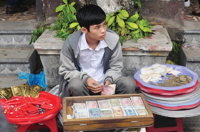 Đổi tiền lẻ dịp Tết: Thói quen không dễ đổi ảnh 4
