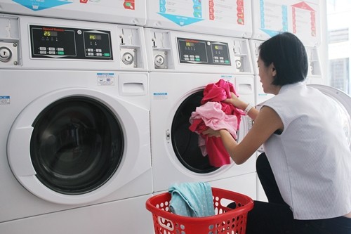 Cửa hàng giặt sấy tự phục vụ nở rộ ở Sài Gòn ảnh 1 Cửa hàng giặt sấy tự phục vụ nở rộ ở Sài Gòn ảnh 1