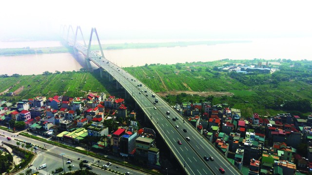 Xu hướng mua nhà tại Hà Nội đang có sự dịch chuyển rõ rệt ra các khu đô thị vệ tinh nhờ sự phát triển mạnh mẽ của hạ tầng kết nối. Ảnh: Dũng Minh.