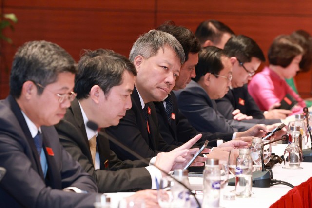 Các đại biểu tại Tổ thảo luận số 7. Ảnh: Nhật Bắc