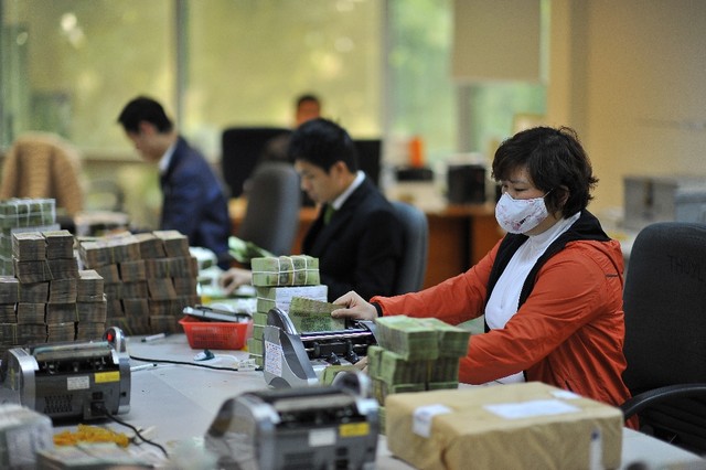 Vietcombank giải thích nguyên nhân tắc ATM dịp Tết ảnh 6