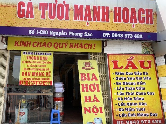 Cửa hàng ăn tại Nguyễn Phong Sắc- Cầu Giấy cũng đã chấp hành nghiêm chỉnh quy định phòng, chống dịch COVID-19. (Ảnh: Phương Linh) Cửa hàng ăn tại Nguyễn Phong Sắc- Cầu Giấy cũng đã chấp hành nghiêm chỉnh quy định phòng, chống dịch COVID-19. (Ảnh: Phương Linh)
