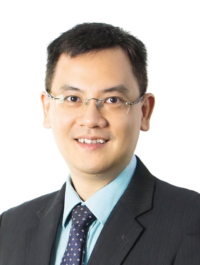 Ông Đinh Đức Quang, Giám đốc điều hành Khối kinh doanh tiền tệ, Ngân hàng United Overseas Bank (UOB). Ông Đinh Đức Quang, Giám đốc điều hành Khối kinh doanh tiền tệ, Ngân hàng United Overseas Bank (UOB).