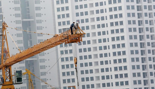 Nhiều doanh nghiệp xây dựng khốn đốn vì nợ đọng. Ảnh: Dũng Minh