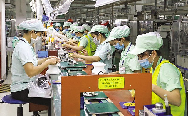 Khu vực sản xuất của Công ty Điện tử Foster tại Khu công nghiệp VSIP Bắc Ninh. Ảnh: Đức Thanh Khu vực sản xuất của Công ty Điện tử Foster tại Khu công nghiệp VSIP Bắc Ninh. Ảnh: Đức Thanh