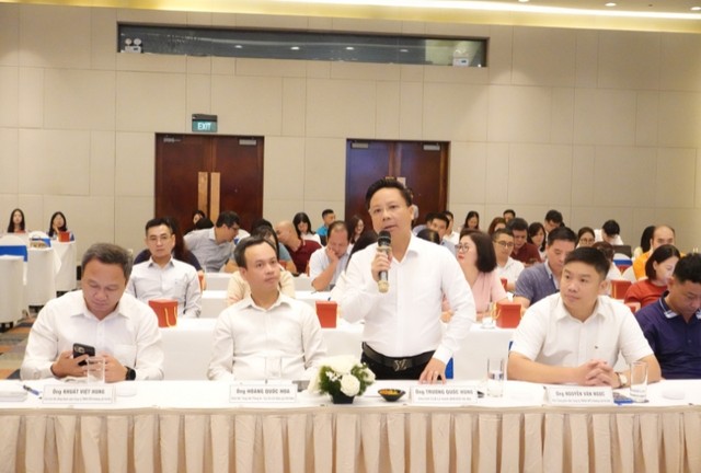 Ông Truong QuoC treo nói tại hội nghị.