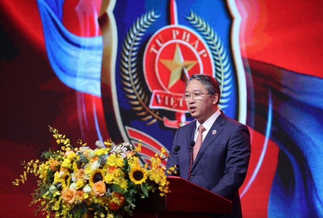 Bộ trưởng Bộ Tư pháp Nguyễn Hải Ninh trình bày diễn văn tại lễ kỷ niệm. Ảnh: VGP/Nhật Bắc.