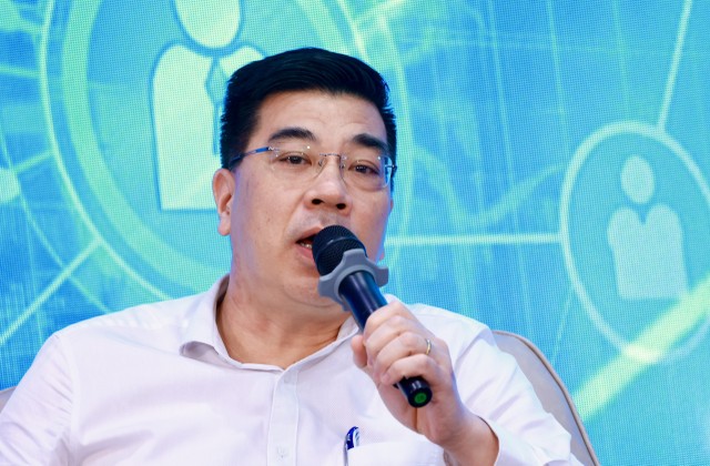 Ông Trần Minh Tuấn, Vụ trưởng Vụ Kinh tế số, Xã hội số, Bộ Thông tin và Truyền thông. Ảnh: Chí Cường