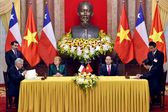 Chủ tịch nước Trần Đại Quang đón Tổng thống Chile Michelle Bachelet ảnh 4