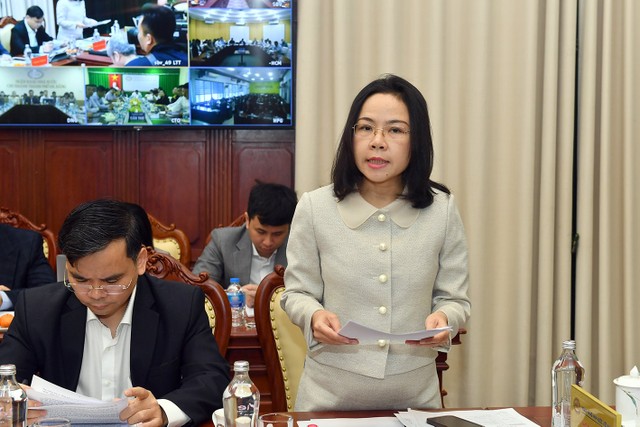 Bà Hà Thu Giang, Vụ trưởng Vụ Tín dụng các ngành kinh tế, Ngân hàng Nhà nước phát biểu tại Hội nghị.