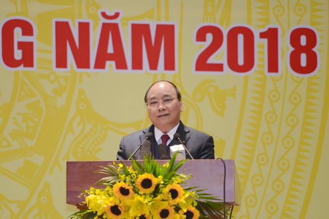 Không nới lỏng chính sách tiền tệ trong 2018 ảnh 1