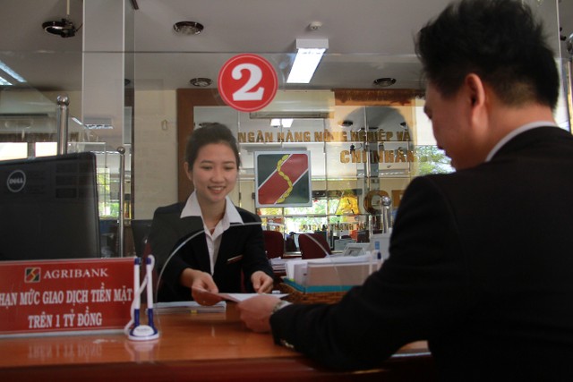 Agribank góp phần đẩy nhanh quá trình xử lý nợ xấu ảnh 1