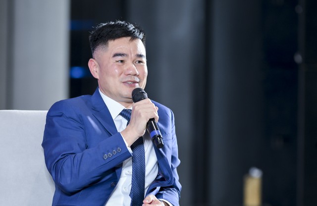 Ông Hoàng Trung Hải, Phó tổng giám đốc, Tư vấn, Dịch vụ Tài chính Ngân hàng, Công ty cổ phần Tư vấn EY Việt Nam phát biểu tại sự kiện.