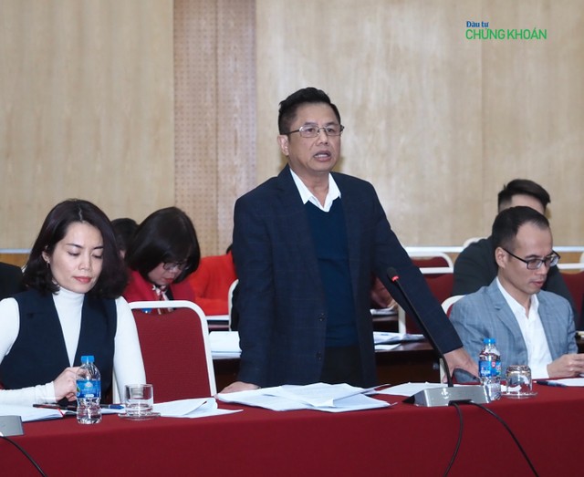 Ông Nguyễn Văn Quang, Phó Vụ trưởng Vụ Tổng hợp pháp chế (KBNN) thông tin tại buổi họp báo chiều 13/1