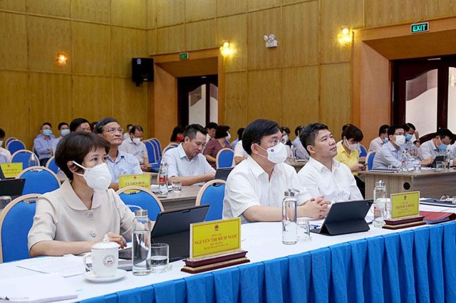 Các đại biểu tham dự từ điểm cầu Bộ Kế hoạch và Đầu tư (Ảnh: Minh Trang)