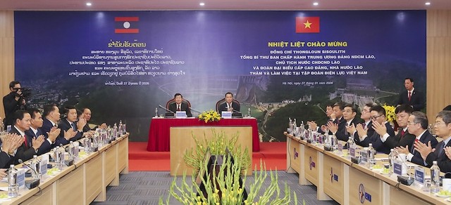 Đoàn đại biểu cấp cao Đảng, Nhà nước Lào làm việc tại Tập đoàn Điện lực Việt Nam. Ảnh: Ng.Tuấn.