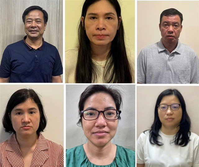 Vợ chồng Nghiêm Quốc Hưng và một số bị can tại Công ty cổ phần Cung ứng nhân lực Hoàng Long. Ảnh: BCA