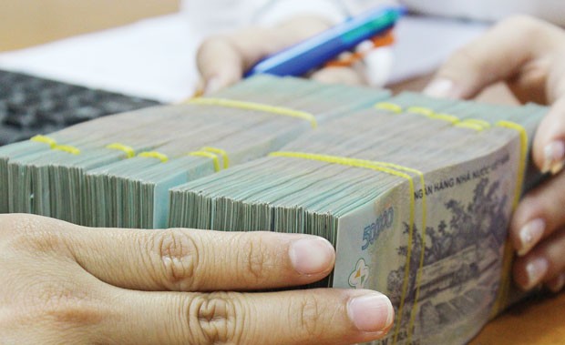 Rủi ro lớn từ chậm xử lý nợ xấu ảnh 1