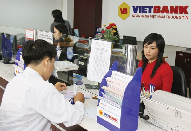 Ngân hàng chạy đua hút vốn ảnh 1