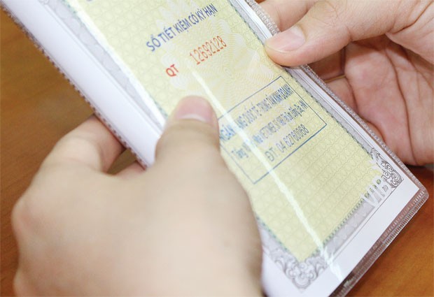 Cổ tức ngân hàng thua xa lãi suất tiết kiệm  ảnh 1