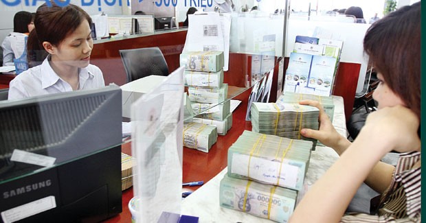 Ngân hàng chuẩn bị thanh khoản sớm ảnh 1