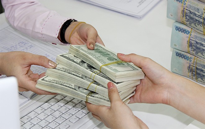 Tỷ lệ nợ xấu đến tháng 12/2014 chiếm 3,25% tổng dư nợ và mục tiêu đưa về 3% vào cuối 2015 là khả thi Ảnh: Hoài Nam