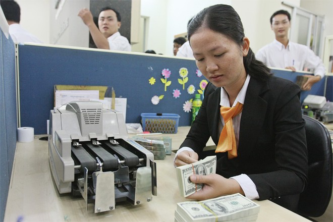 Tỷ giá USD/VND niêm yết tại DongA Bank ngày 25/12 tăng 15 đồng/USD so với hai ngày trước 