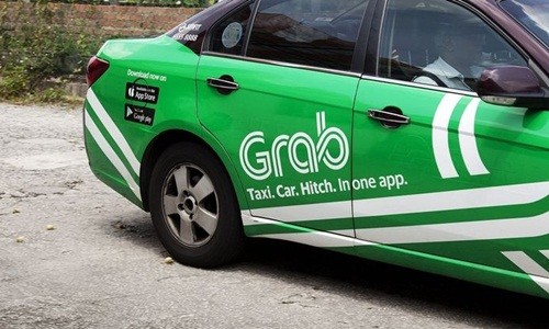 Grab hiện là đối thủ lớn nhất của Uber tại Đông Nam Á. Ảnh: Bloomberg