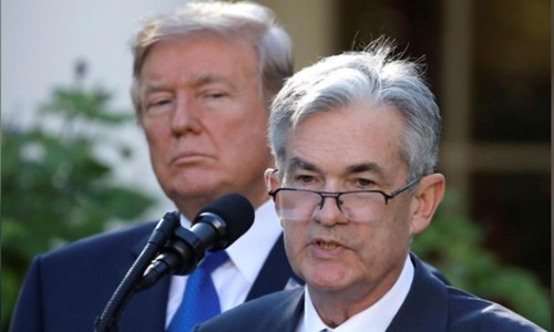 Tổng thống Mỹ - Donald Trump và Chủ tịch Fed - Jerome Powell. Ảnh: Reuters