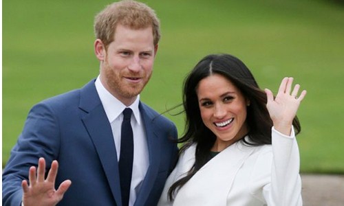 Hoàng tử Anh Harry và hôn thê Markle. Ảnh: AFP