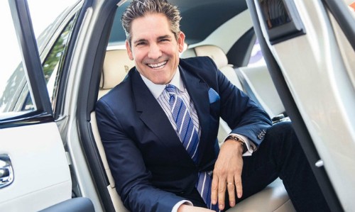 Triệu phú Grant Cardone quan niệm tiền để một chỗ là lãng phí. Ảnh: Cnbc.