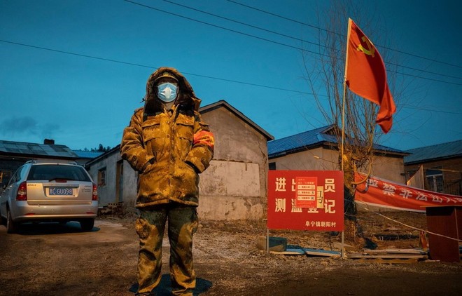 Thành phố Cáp Nhĩ Tân bị phong tỏa để ngăn chặn sự lây lan của dịch COVID-19. (Nguồn: AFP).