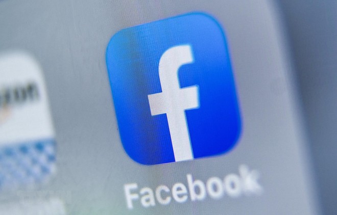 Biểu tượng của Facebook trên màn hình máy tính bảng. (Ảnh: AFP/TTXVN).