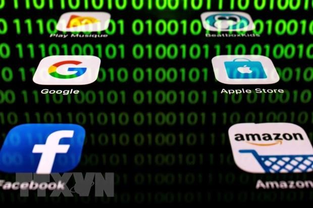 Biểu tượng của Amazon, Apple, Google và Facebook. (Ảnh: AFP/TTXVN).