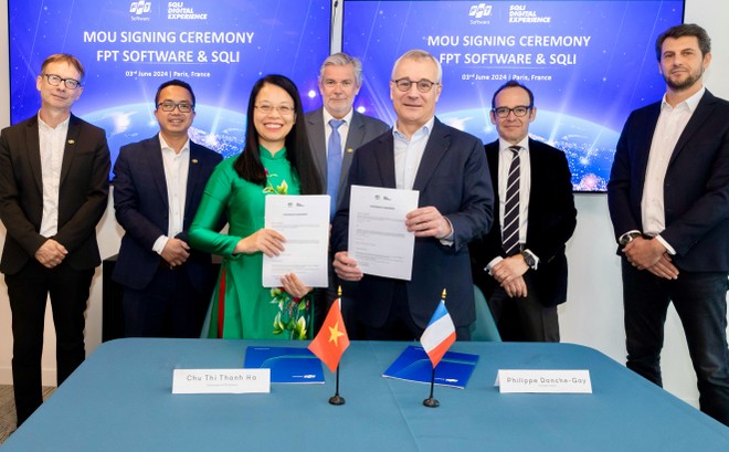 Lễ ký kết Biên bản ghi nhớ diễn ra tại Paris với sự tham gia của Chủ tịch FPT Software Chu Thị Thanh Hà, CEO Tập đoàn SQLI Philippe Donche-Gay và đại diện hai công ty.