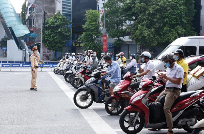 Việc bỏ bảo hiểm bắt buộc xe máy khó thực hiện trong một sớm, một chiều. Ảnh: Dũng Minh