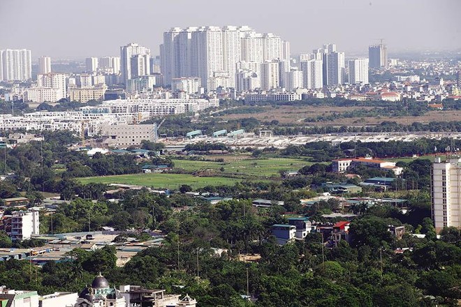 Còn khá nhiều ý kiến khác nhau về quy định chuyển mục đích sử dụng đất để thực hiện dự án đô thị, nhà ở thương mại... Ảnh: Đ.T