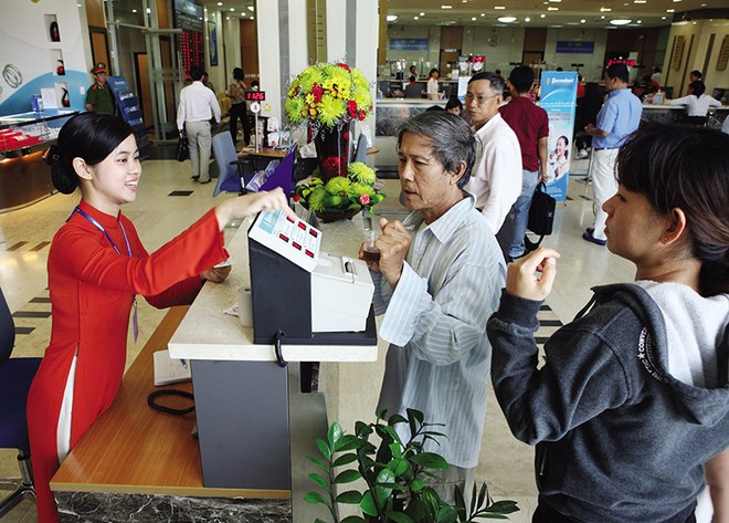 Tranh cãi về mức room ngoại tại Sacombank đến nay vẫn chưa ngã ngũ. Ảnh: Đức Thanh