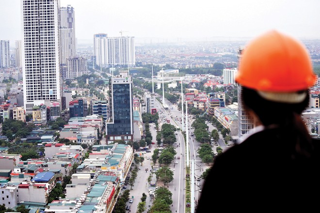 Điều doanh nghiệp bất động sản cần làm lúc này là tập trung vào lĩnh vực cốt lõi. Ảnh: Dũng Minh 