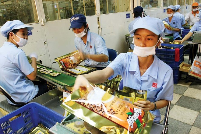 Công nhân làm việc trong một nhà máy ở Khu công nghiệp Biên Hòa 1 Ảnh: Lê Toàn