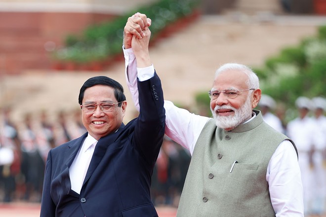 Thủ tướng Ấn Độ Narendra Modi nhiệt liệt chào đón Thủ tướng Phạm Minh Chính thăm cấp Nhà nước tới Ấn Độ. (Ảnh: Nhật Bắc)