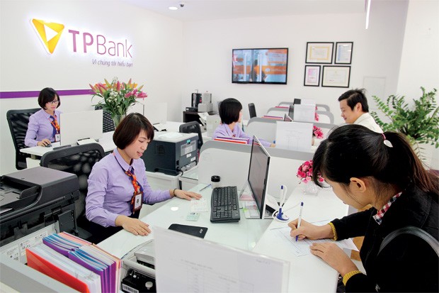 Lượng tiền mặt rút khỏi ngân hàng tăng mạnh ngày giáp Tết