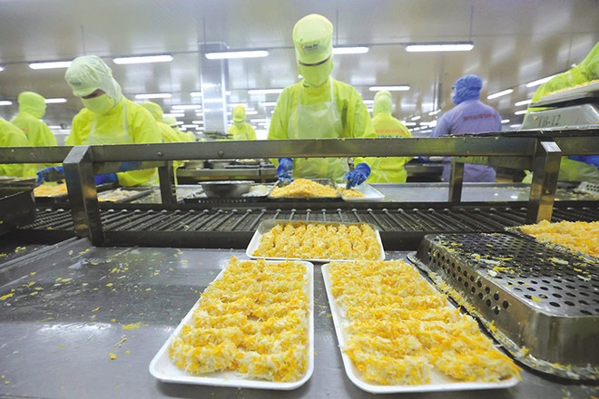 Cải thiện môi trường đầu tư kinh doanh phải đồng bộ từ cơ chế, chính sách, thủ tục hành chính, nền tảng số, đến bảo hộ quyền sở hữu trí tuệ, nhằm khuyến khích khu vực tư nhân phát triển. Ảnh: Đức Thanh.