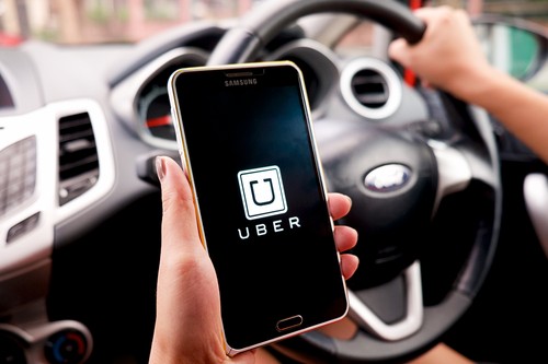 Uber đã có một năm kinh doanh chật vật. Ảnh: Reuters