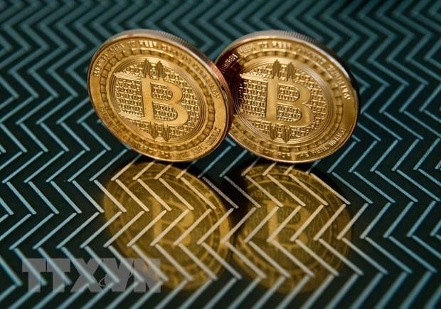 Đồng tiền kỹ thuật số bitcoin. (Ảnh: AFP/TTXVN)