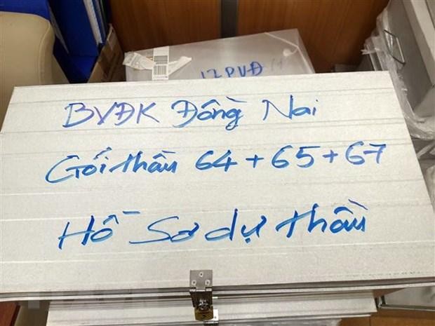 Nhiều tài liệu liên quan đến vụ án bị lực lượng chức năng thu giữ. (Ảnh: Phạm Kiên/TTXVN)