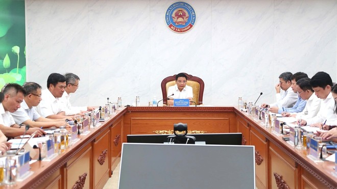 Bộ trưởng Bộ Tài chính Nguyễn Văn Thắng chủ trì hội nghị. (Ảnh: Đức Minh)