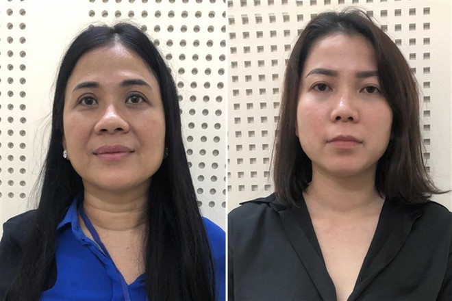 Bị can Mai Thị Hồng Hạnh (bên trái) và Nguyễn Thị Như Phương. Ảnh: BCA